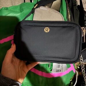 lululemon athletica Black Crossbody Bag with Gold Logo